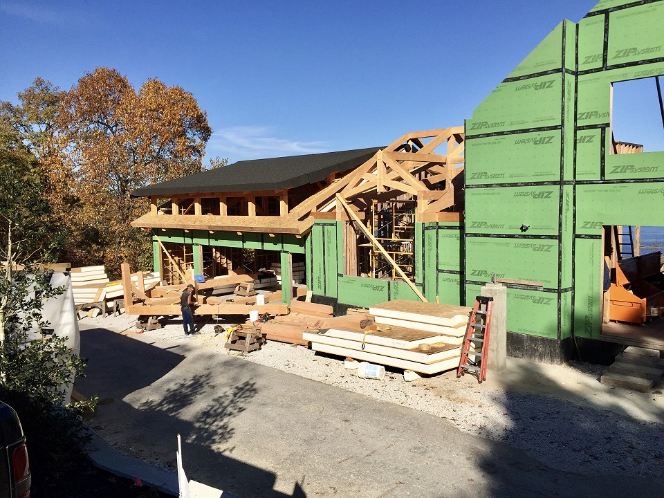 Under Construction: Exterior View Of Garage And Dining Room Scissor Truss